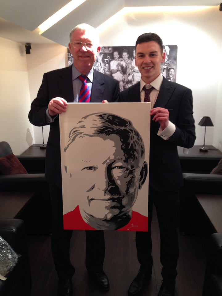 Sir Alex Ferguson with his commissioned painting by Jamie 